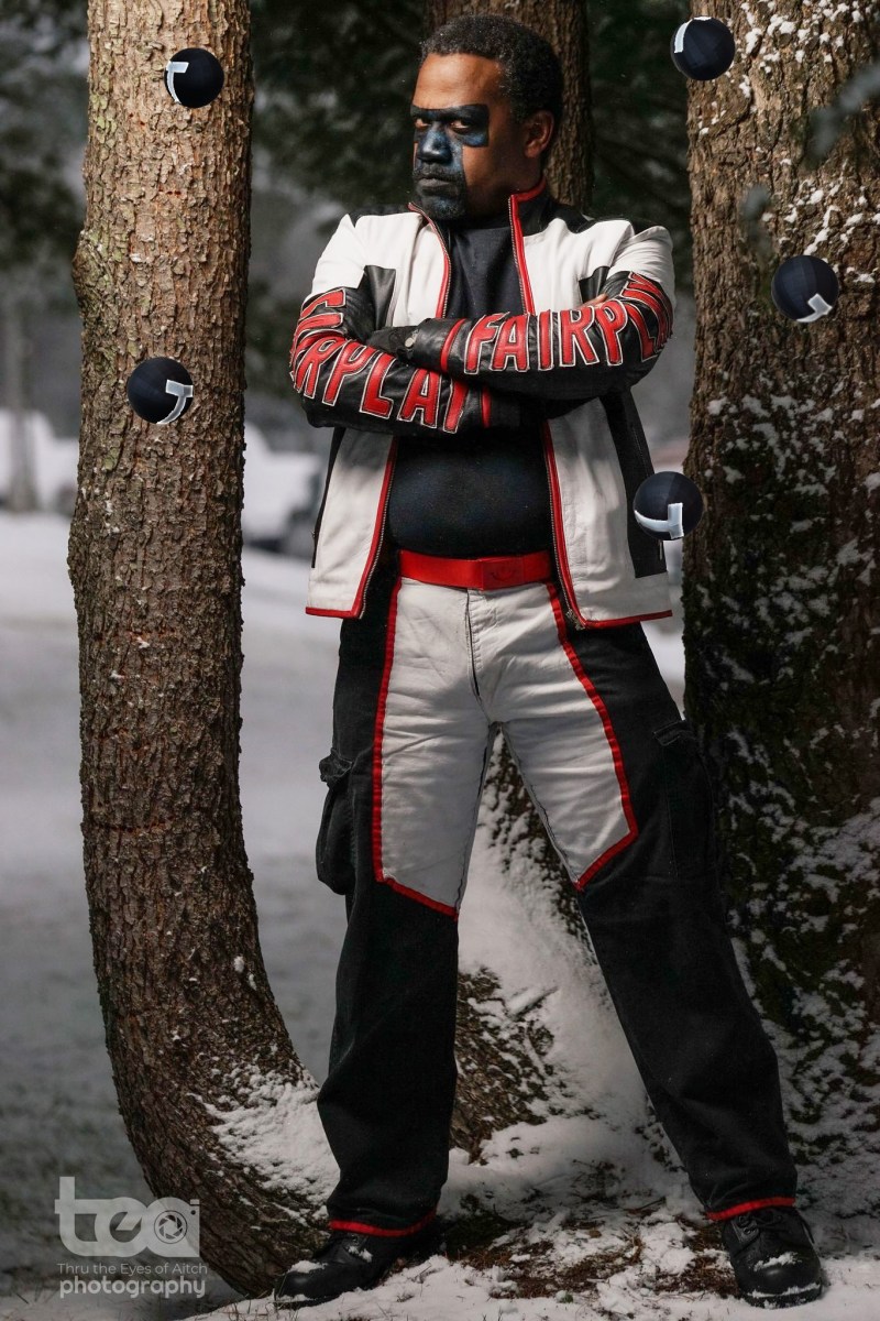 Corey Morgan cosplaying as Mr Terrific