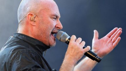 Phil Collins singing.