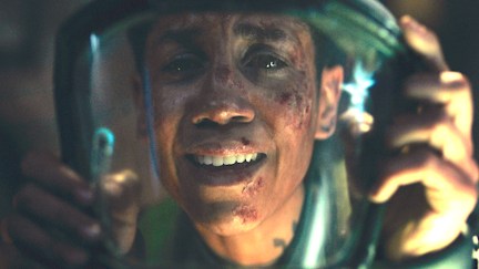 Dominique Tipper looks at a view screen as Naomi Nagata in The Expanse season five finale