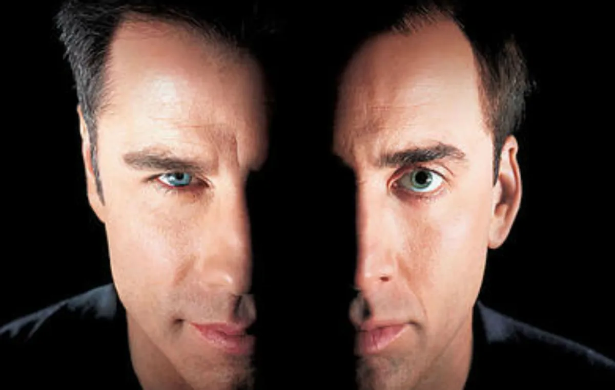 john travolta and nic cage in face/off poster