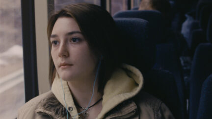 Sidney Flanigan as Autumn in NEVER RARELY SOMETIMES ALWAYS, sits on a bus staring out the window.
