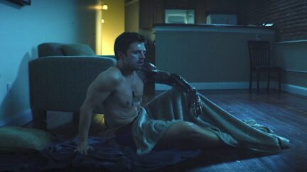 Sebastian Stan as Bucky Barnes sleeping on the floor in The Falcon and the Winter Soldier