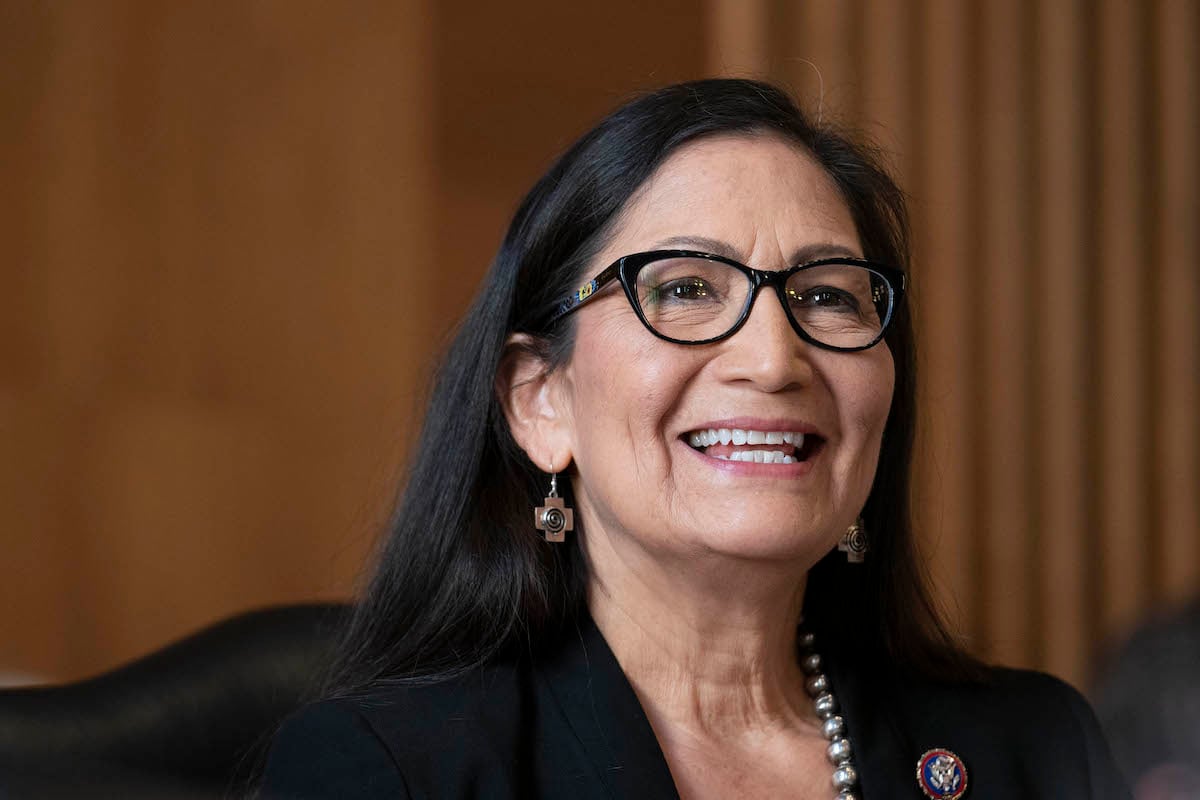 Rep. Deb Haaland (D-NM), nominee for Secretary of the Interior, grins during her confirmation hearing