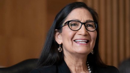 Rep. Deb Haaland (D-NM), nominee for Secretary of the Interior, grins during her confirmation hearing