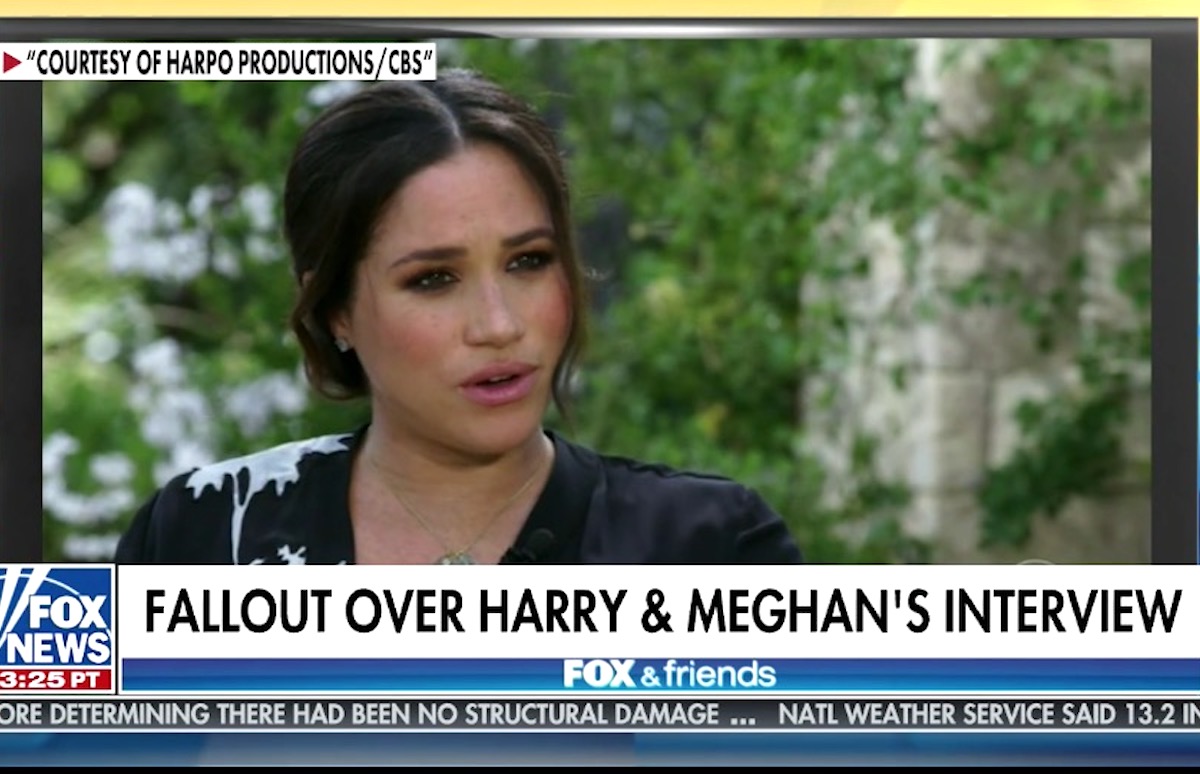 Fox News plays a clip of Meghan Markle speaking to Oprah with a Chyron reading "Fallout over Harry & Meghan's interview"