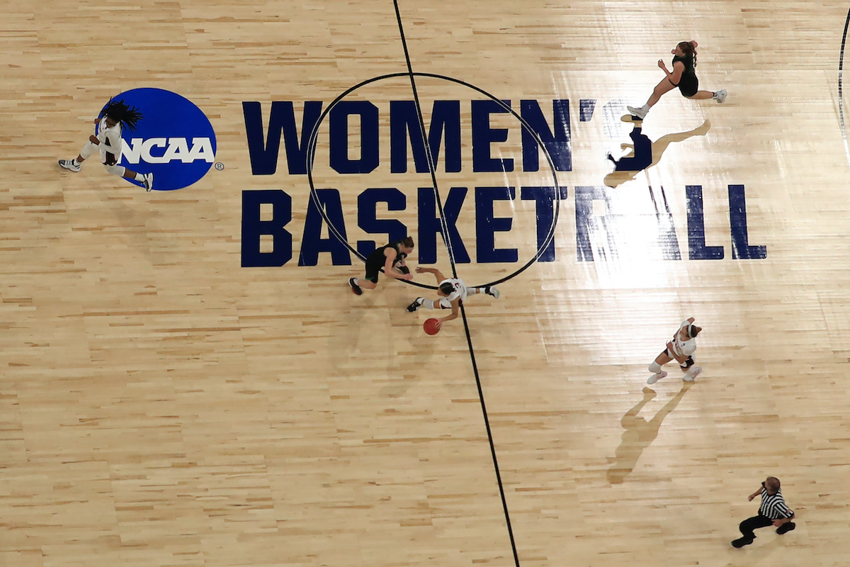 Overhead view of an NCAA women's basketball game