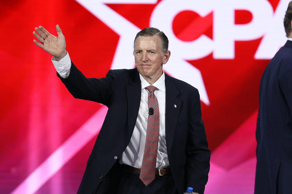 Rep. Paul Gosar waves from the stage at CPAC.