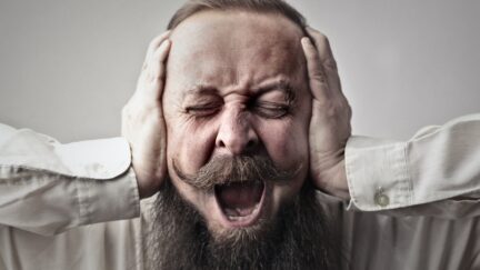 bearded man screaming