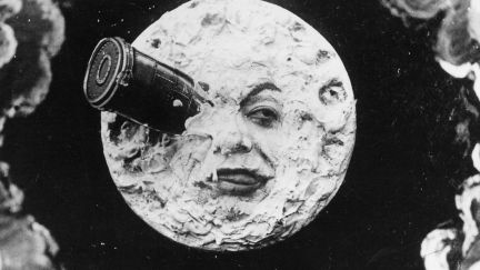 A scene from Georges Méliès‘s 1902 film A Trip to the Moon, the moon with a rocket in it's eye