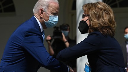 US President Joe Biden greets former US Representative Gabby Giffords after he spoke about gun violence prevention in the Rose Garden of the White House in Washington, DC, on April 8, 2021. - Biden unveiled measures aimed at curbing rampant US gun violence, especially seeking to prevent the spread of untraceable 