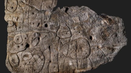 an ancient carved stone slab that is actually a map
