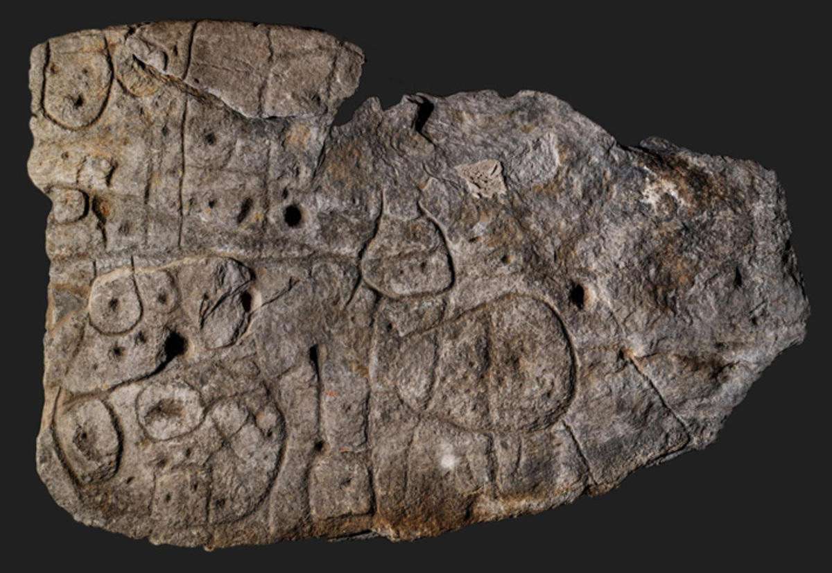 an ancient carved stone slab that is actually a map
