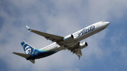 Alaska airlines plane in flight