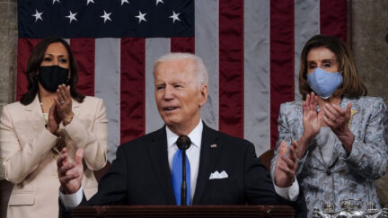 President Joe Biden addresses a joint session of Congress, with Vice President Kamala Harris and House Speaker Nancy Pelosi (D-Calif.) on the dais behind him