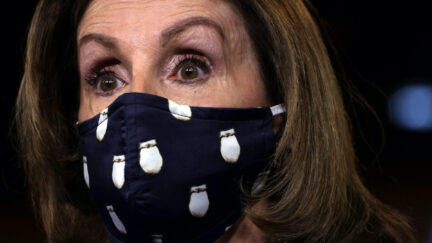 U.S. Speaker of the House Rep. Nancy Pelosi (D-CA) speaks while wearing a mask