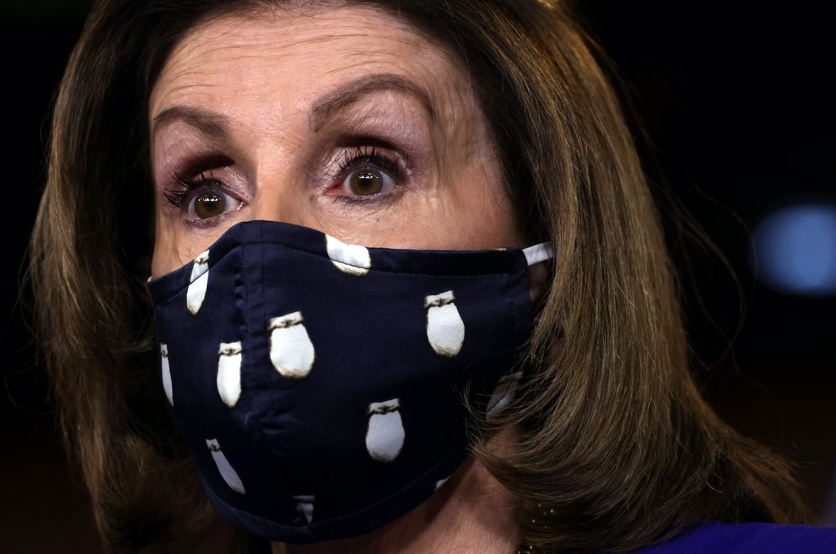 U.S. Speaker of the House Rep. Nancy Pelosi (D-CA) speaks while wearing a mask