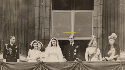 Members of the British royal family on the balcony at Buckingham Palace after the wedding of Princess Elizabeth and Philip Mountbatten (later Queen Elizabeth II and Prince Philip, Duke of Edinburgh), London, 20th November 1947. Left to right: King George VI, Princess Margaret, Lady Mary Cambridge, Elizabeth, Philip, Queen Elizabeth (later Queen Mother) and Queen Mary. (Photo by Evening Standard/Hulton Archive/Getty Images)