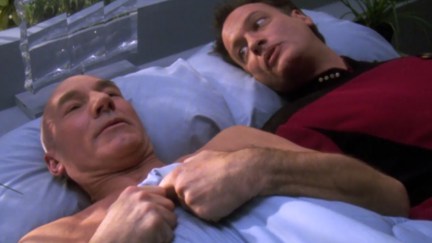 John de Lancie as Q and Patrick Stewart as Picard