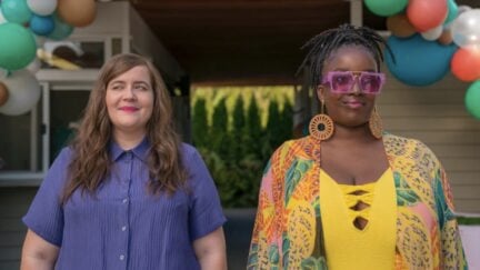 Aidy Bryant's Annie and Lolly Adefope's Fran stand side by side on Hulu's Shrill.