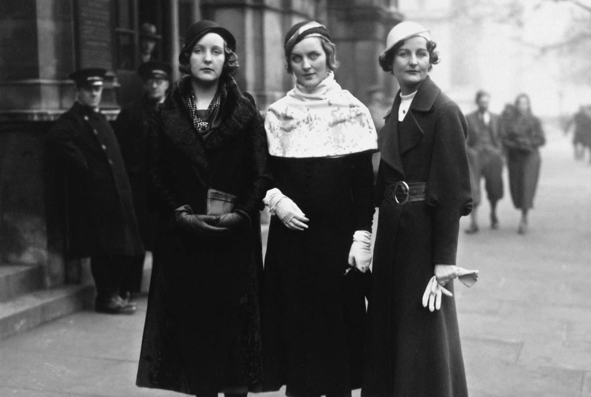 1932: Three of the Mitford sisters at Lord Stanley of Aldernay's wedding. From left to right: Unity Mitford; Diana Mitford (Mrs Bryan Guinness, later Lady Diana Mosley) and writer Nancy Mitford. (Photo by Hulton Archive/Getty Images)