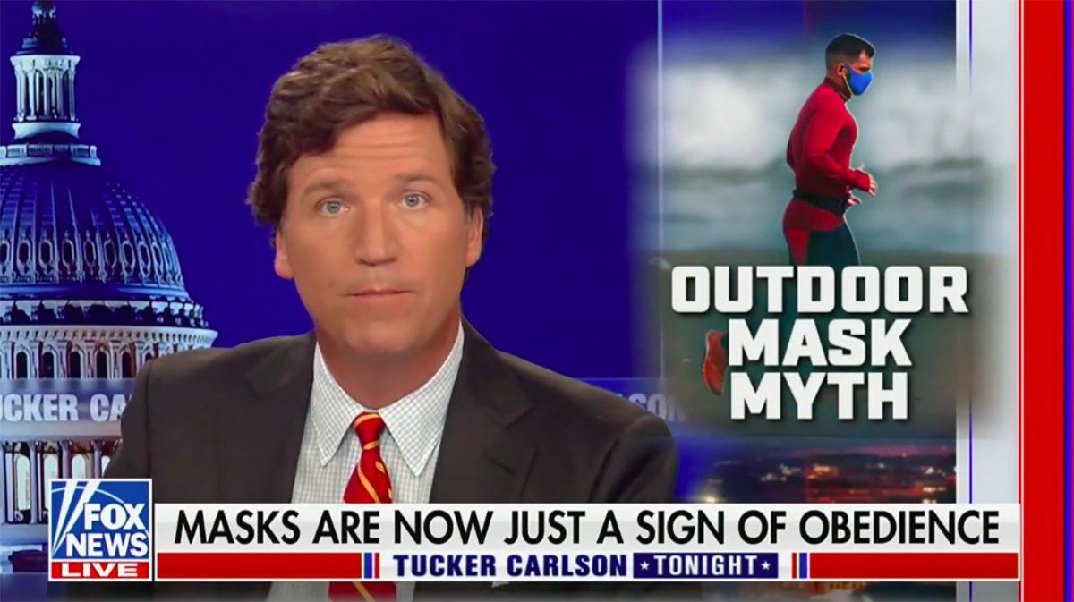 Tucker Carlson's makes a stupid face above a chyron reading "Masks are now just a sign of obedience"