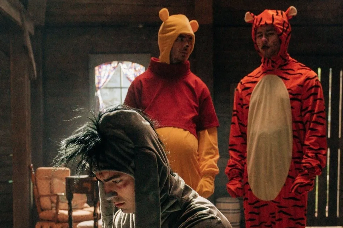 Jonas Brothers in James Corden skit about the gritty tale of how Eeyore from Winnie the Pooh became depressed.