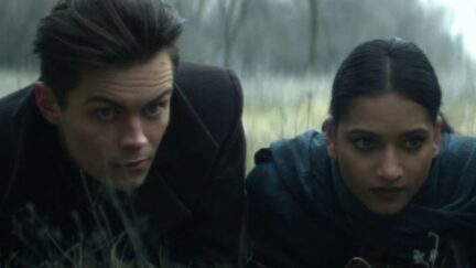 Shadow and Bone interview with Mairzee Almas about Kaz and Inej, who are pictured.