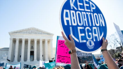 Pro-choice activists supporting legal access to abortion protest during a demonstration outside the US Supreme Court in Washington, DC