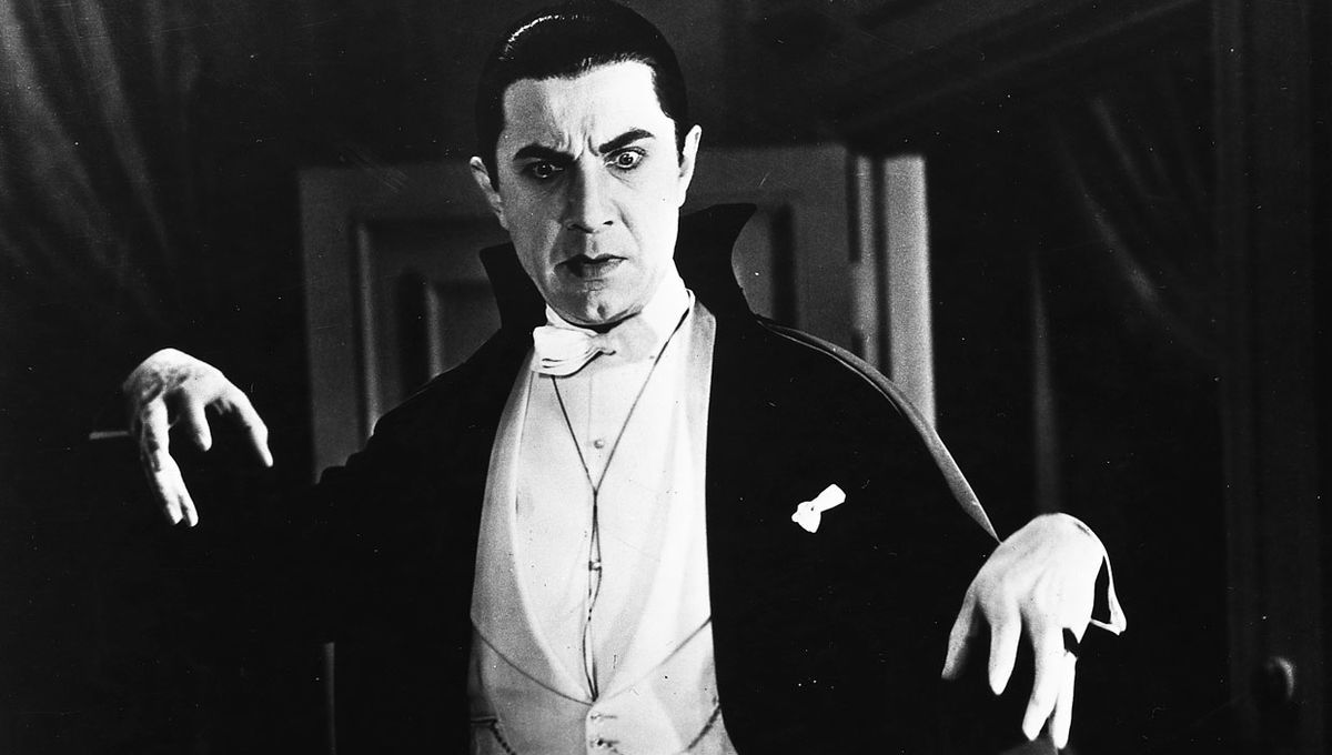 Bela Lugosi lurks with his hands hovering as Count Dracula in "Dracula"