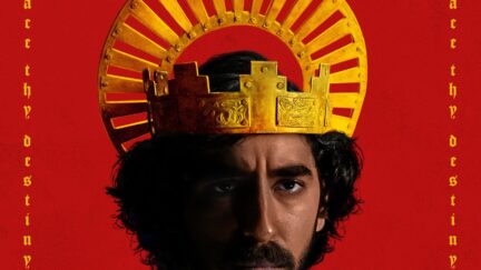 Dev Patel as Sir Gawain wears a crown in a promotional poster for The Green Knight movie