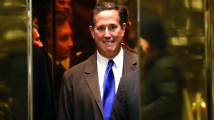 Rick Santorum bites his lip while his elevator door closes