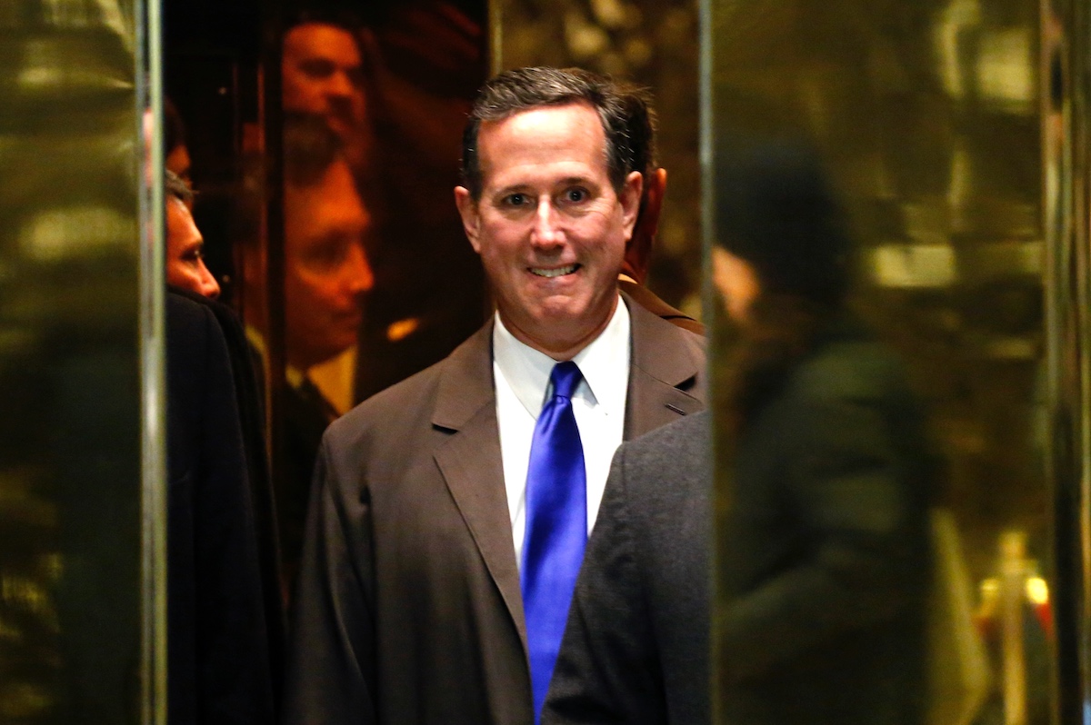Rick Santorum bites his lip while his elevator door closes
