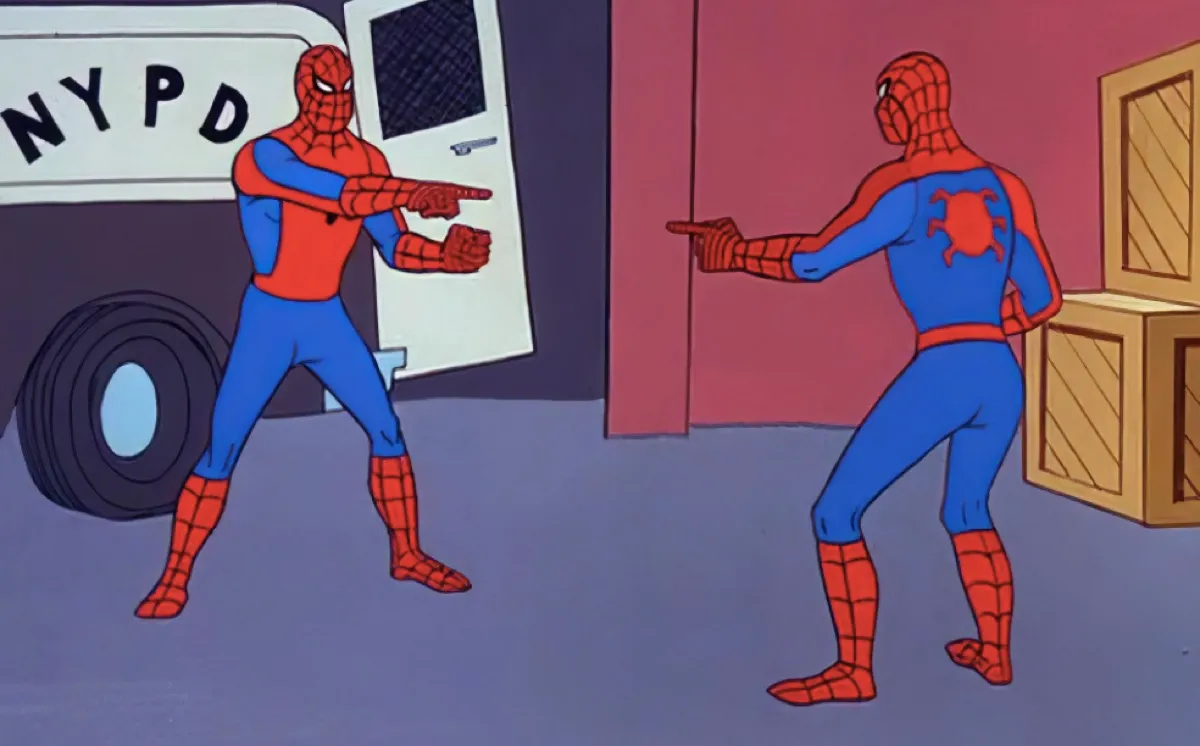 Spider-Man pointing at another Spider-Man, who is pointing back.