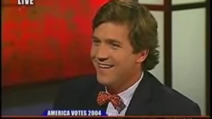 Tucker Carlson smirks in an old CNN clip above a chyron reading 