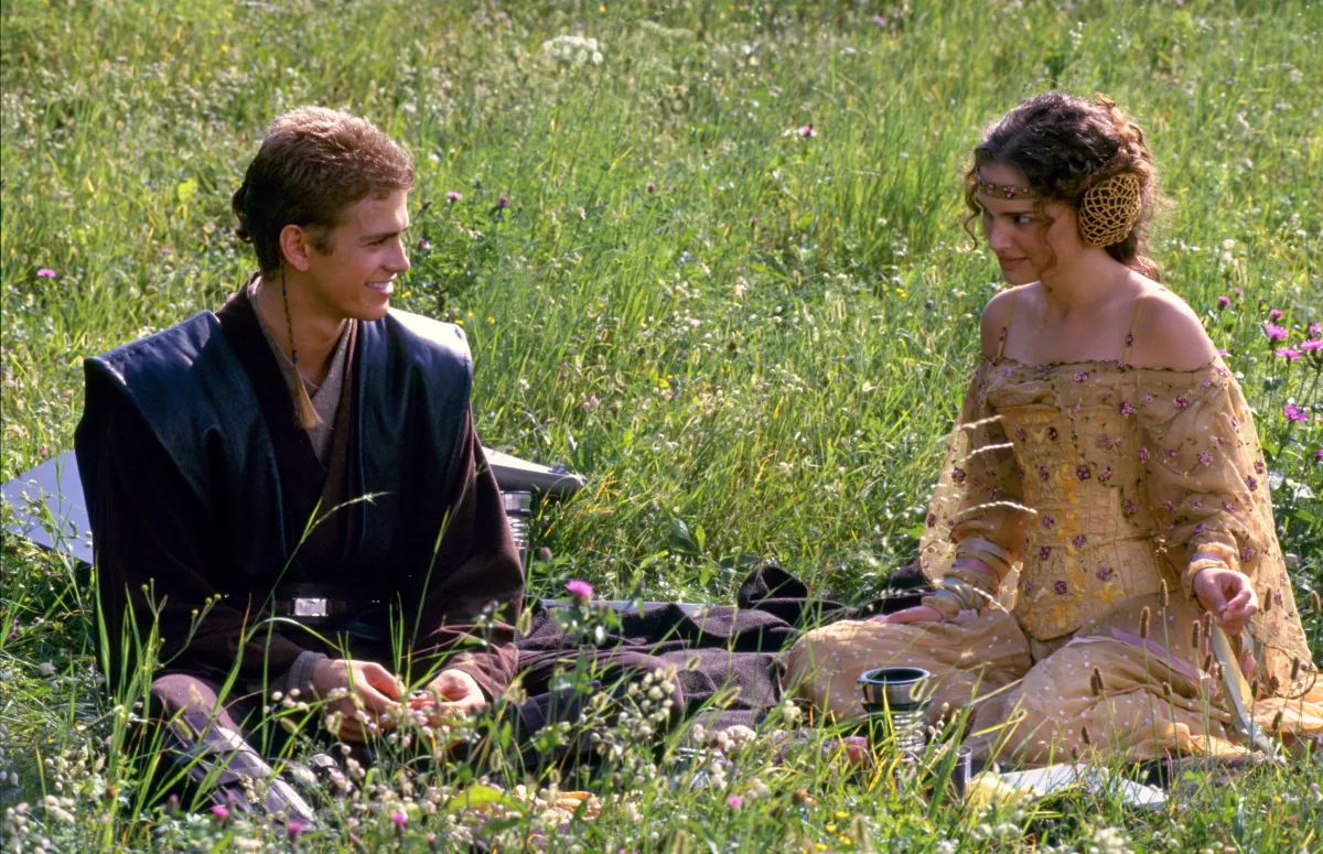 Anakin and Padme in a field