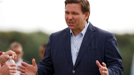 Gov. Ron DeSantis with fans during Day One of the Walker Cup at Seminole Golf Club.