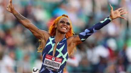 Sha'Carri Richardson celebrates winning the Women's 100 Meter.