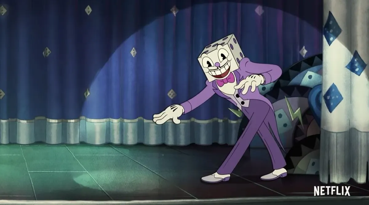 A cosplayer dressed as King Dice from the video games Cuphead