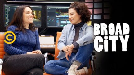 Abbi and Ilana chatting on a couch in Broad City.