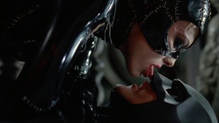 batman can't go down on catwoman, but she can lick his face