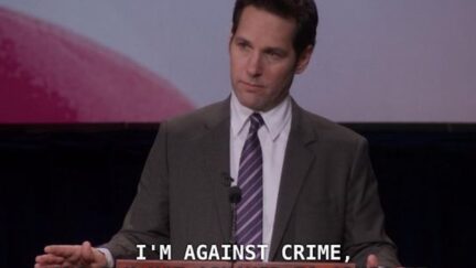 Bobby Newport (Paul Rudd) on Parks & Recreation stands at a podium and says 