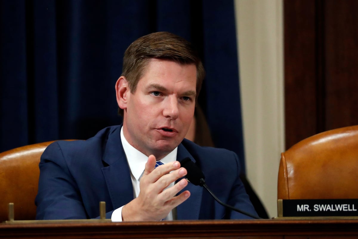 Rep. Eric Swalwell speaks from his desk in the House.