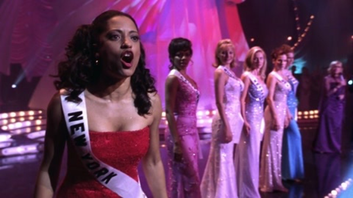 Karen shouting on stage in Miss Congeniality.