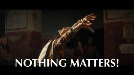 Loki throwing his hands up and shouting 