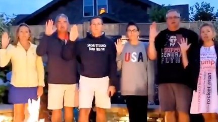 Michael Flynn and five members of his family stand outside, raising their right hands as they repeat an oath.