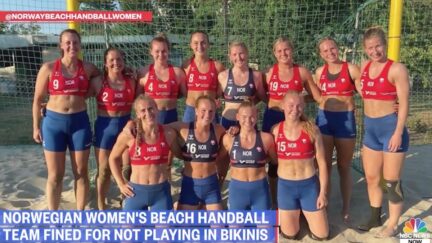 A photo of the Norwegian women's beach handball team wearing shorts in a team photo, as shown on NBC News