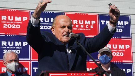 Attorney for the President, Rudy Giuliani, speaks at a news conference in the parking lot of a landscaping company