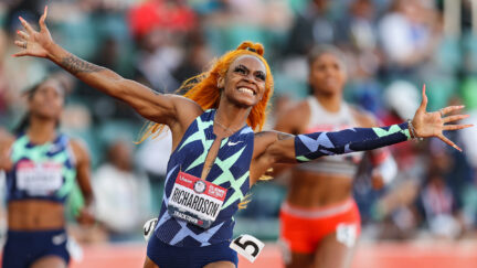Sha'Carri Richardson celebrates winning the Women's 100 Meter final