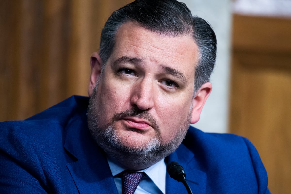 Ted Cruz looks confused while sitting in the Senate chamber