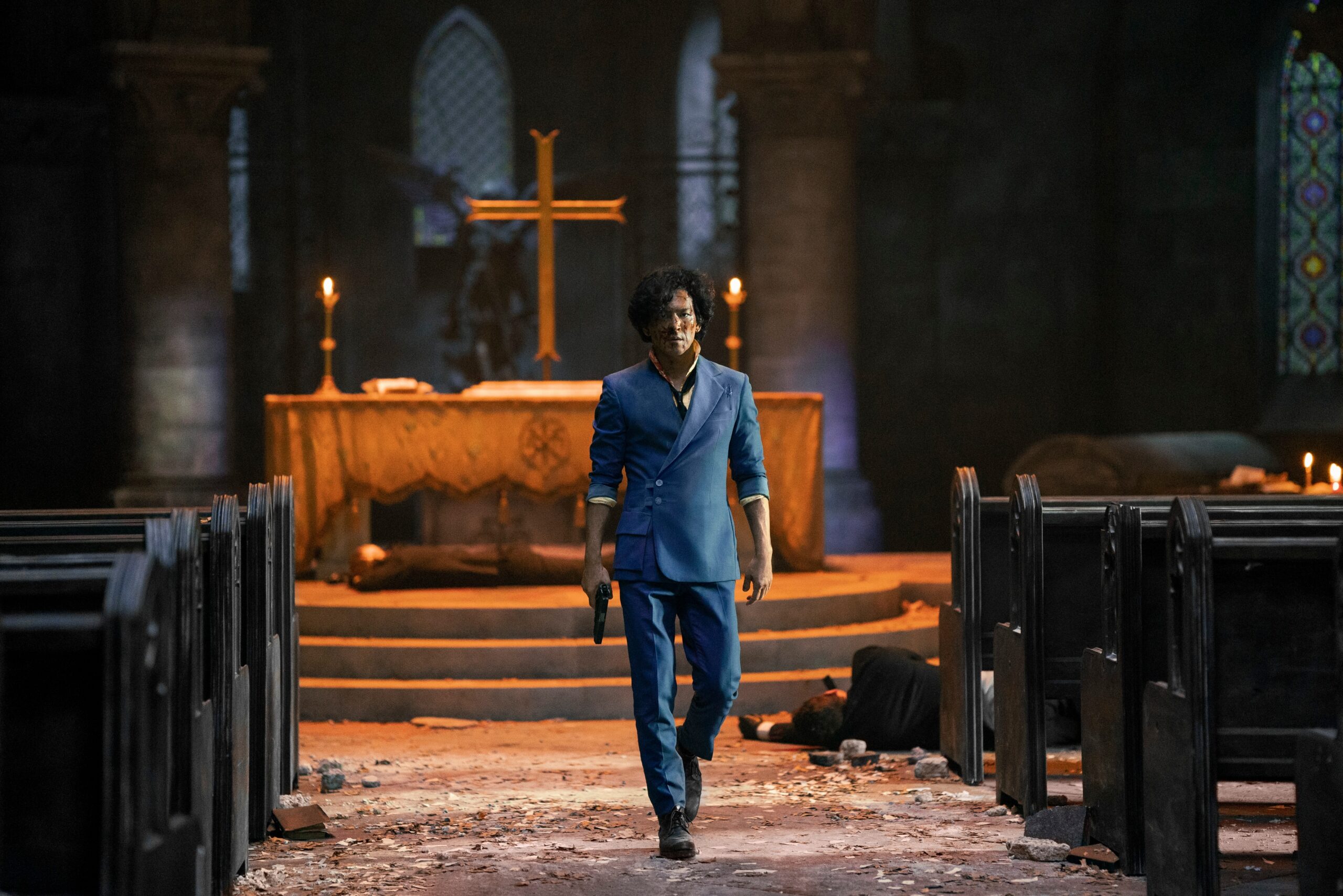 Spike in a church holding a gun in Netflix's live-action Cowboy Bebop.